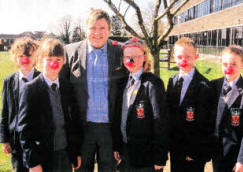 Principal for a Day Aaron Ritchie with Year 8 pupils.