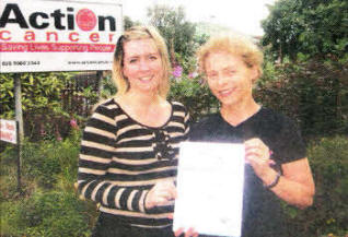Moira woman Irene McCafferty receives a certificate from Lucy McCusker, PR and Events Officer from Action Cancer for raising £2,000. Irene organised two Boot Camps in June, one in Wallace Park and one in Lurgan Park. Participants all had to get sponsored to take park which helped raise the excellent sum of £2,000.
