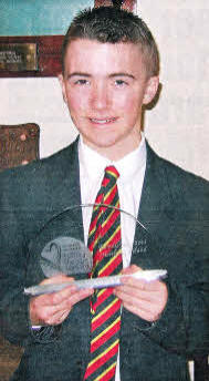 Adam Kerr with his National Hero award.