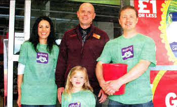 Stephen, Michelle and Poppy Laverty with Sainsbury's manager John