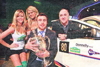 At the launch of the 2011 Circuit of Ireland Rally is Ireland winger Tommy Bowe and 2010 Circuit of Ireland champion Derek McGarrity with Rally fans Sarah and Laurina Kennedy.