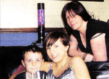Cathy with her children Daniel and Sarah-Louise.