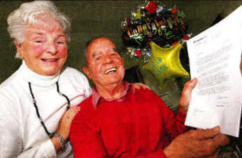 Cecil and Sylvia Walker with news of the MBE.