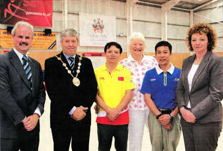 Welcoming China's top two gymnastics coaches, Jingbin Xiong and Weiguo Jin, to Salto City of Lisburn National Gymnastics Centre are: (l-r) Councillor Thomas Beckett, Chairman of the Council's Leisure Services Committee; the Mayor of Lisburn, Councillor Brian Heading; Dame Mary Peters DBE, President of Salto and Sports Minister Caral Ni Chuilin.