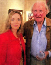 Artist David Shepherd with the Ulster Star's Stacey Heaney.