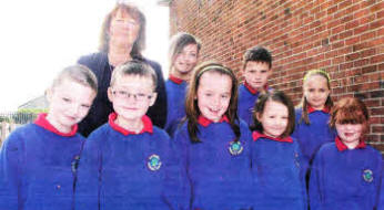 Derriaghy Primary School Principal Mrs Gladys Topping with children at the School. US1910-110A0