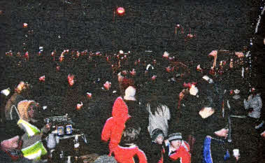 Some of the crowd who gathered in Bamford Park for the lighting of the Christmas Tree.