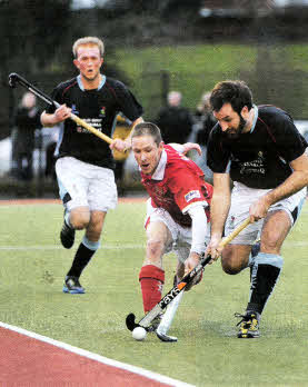 Andrew Barbour, Cookstown and Michael Harte, Lisnagarvey in action.