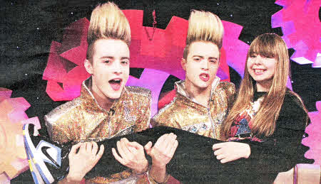 Lisburn girl Hannah Roberts with Jedward, who made her dream come true and arranged for her to swim with Fungi, the famous dolphin.