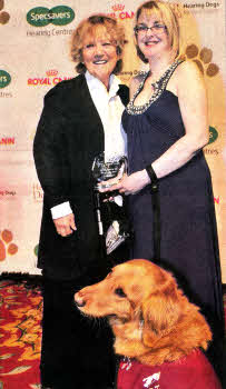 Samantha and Jester with actress Julia Foster who presented her award.