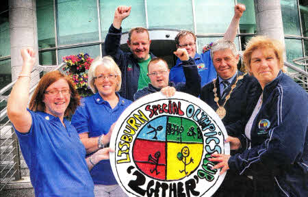 Celebrating the announcement that the Mayor of Lisburn, Councillor Brian Heading, has selected Lisburn 2gether Special 0lympics Club as his Mayoral Charity are Helen Mahood, Secretary of the Club; Lorraine Foster, Chairperson of the Club; Jamsie O'Neill, Athlete, and Joan Thompson, athlete. Also pictured in the back row are Athletes Stephen Gibson and Andrew Welch.