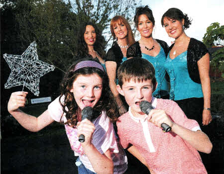 Budding 'Little Stars', Jessica and Donal Healy sing out for The Leading Ladies, Ceara Grehan, Lynne McAllister, Michelie Baird and Mairead Healy.