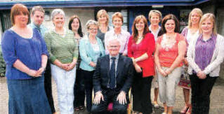Maghaberry Primary School Principal David Taylor with members of staff on his retirement- US2611-109A0