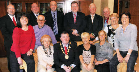 At the final meeting of the Mayor's Charity Working Group on Tuesday May 24 are L to R: (front two rows) Valerie Martin (Secretary), Joe Tumelty, Stella Stewart, Councillor Paul Porter (Lisburn Mayor), Anne Blake (Chairperson), Jacquellne Wood, Iris Baxter and Gloria Smyth- (back row) Councillors Paul Stewart, William Leathern, James Tinsley and Jonathan Craig MLA and former councillors Ivan Davis and Cecil Calvert.