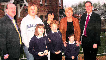 Councillor Paul Stewart, Lindsay Myer, with daughter Chloe, Nicola Moorhead with son Leon and Heather Donaghy with Ellie and MLA Paul Givan at Windermere Drive