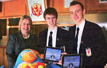 Mark Thompson and Ashley Hunter with Wallace principal Deborah O'Hare.