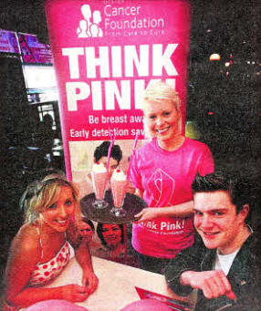 Suzi Mcllwain from Ulster Cancer Foundation serves milkshakes to Katie Cochrane and Alex Jackson to promote Pink Ladies Night in aid of Ulster Cancer Foundation. US101 -141A0