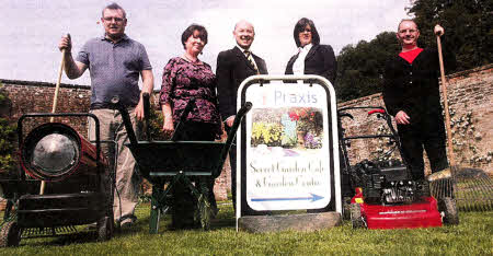 Denis Lavery (Praxis Trainee), Mary Clarke Assistant Director Praxis Care, Philip McClurg interim Chairman Ulster Bank Staff Charity Fund in NI, Elizabeth McGuiness Ulster Bank Hillsborough Branch Manager and John Henry (Praxis Trainee) pictured at Hillsborough Secret Garden where the Ulster Bank has made a Donation to buy Garden Tools. US1611-11OA0