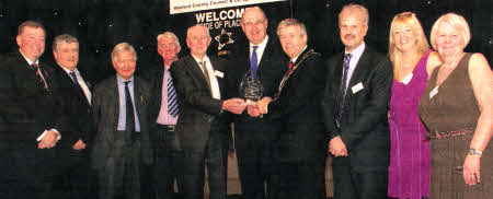 Representatives from Crewe Utd receive their Pride of Place Award from Minister for the Environment Phil Hogan TD, Christopher Moran, Chairman of Co-operation Ireland and Tom Dowling, Chairman of Pride of Place Committee