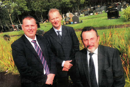 Pictured with Councillor Andrew Ewing, Chairman of the Council's Environmental Services Committee to celebrate the retention of the 'Roses in Towns' award by Lisburn for the third consecutive year are: (I-r) Mr Mark Gregg, Parks Officer, Lisburn City Council and Mr Roy Hanna, Assistant Director of Environmental Services