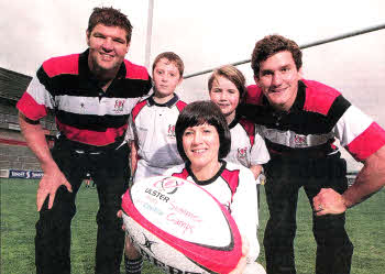Ulster Rugby players Johann Muller and Robbie Diack join David Graham (12) and Eve Hughes (11) from Aquinas Grammar School, Belfast and Centra Brand Manager Nicky Kelly, front, to launch this year's Ulster Rugby Summer Camps, which are sponsored by Centra and its independent retailers. Picture: Brian Thompson/Press Eye