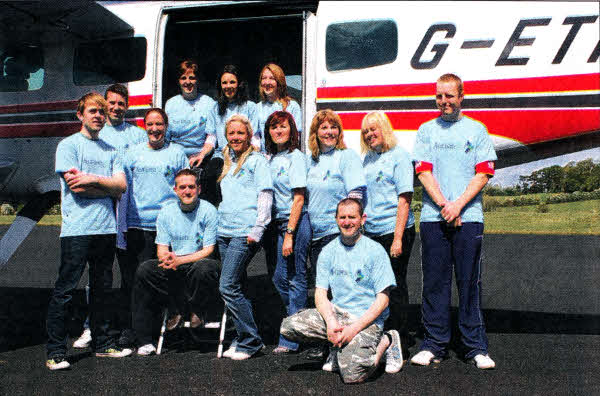 Successful Skydivers: Back left-right Catherine Griffin, Michelle Laverty & Olwen Bleakley. Middle row from left-right Jason McClure, Mark McGimpsey, Michaela Phillips, Aaron Heasley, Julie Wilson, Lisa McCusker, Nicola Williams, Lee Heasley, Shree Nesbitt and Robert McCorkindale.