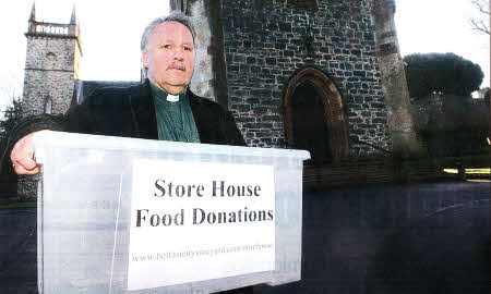 Reverend Mike Dornan pictured after donations of food collected for people in need this Christmas were stolen from the church. It happened during a sermon about food poverty at St Malachy's in Hillsborough on Sunday. US4711.118A0