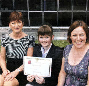 Mrs Norma Cairns and Mrs Gillian Carson pictured with Wallace Year 8 pupil Jilana Currie who became the first ever pupil to achieve a Diamond Award at the recent Year 8 Awards Ceremony.