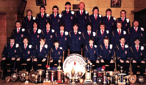 -- with their trophies in the 198Os
