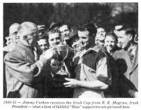 1950-51 - Jimmy Corken receives the Irish Cup from R. K. Megran, Irish President- what a host of faithful "Blue" supporters are pictured here