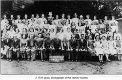 A 1939 group photograph of the factory workers