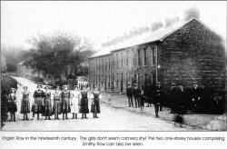 English Row in the nineteenth century. The girls don't seem camera shy! The two one-storey houses comprising