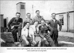 Robert crossey (back right) together with one WAAF and five airmen beside the boiler house and cookhouse at Long Kesh