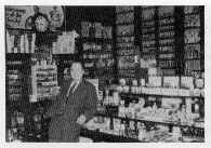 Interior of Pharmacy prior to modernising and Mr. T. McClatchey then Grocery Manager.