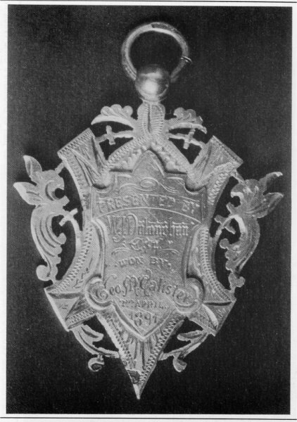 "THE SPEAKING MEDAL" This ornate silver medal has come into the possession of a member of the Historical Group. As can be seen by the photographs, one side reads 'Presented by W. J. Doloughan, Esq. won by Geo. McCalister 2nd April 1891.' and the other'Backnamullough Elocution Class Conducted by Mr. Jas. A. McClughan'. Any information concerning it would be gratefully received and should be given to the editorial committee.