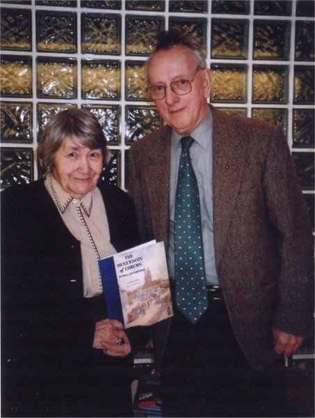 The 2003 Chairman of the Society, Finny O'Sullivan, with Mrs Joyce Best at the launch of the reprint of her successful book The Huguenots of Lisburn, the Story of the Lost Colony