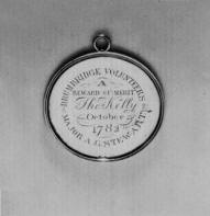 Fig. 6. Badge of the Drumbridge Volunteers, presented by Major Alexander George Stewart to Thomas Kelly, in October 1782. (Collection Ulster Museum).