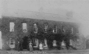 Sunnyside, in Glenavy Main Street, c.1910. The house is still there though somewhat altered, as the creeper was removed and the facade pebble-dashed. An additional entrance was made via the fourth ground floor window from the right and a porch built on. (Photograph courtesy of Brian McKeown,