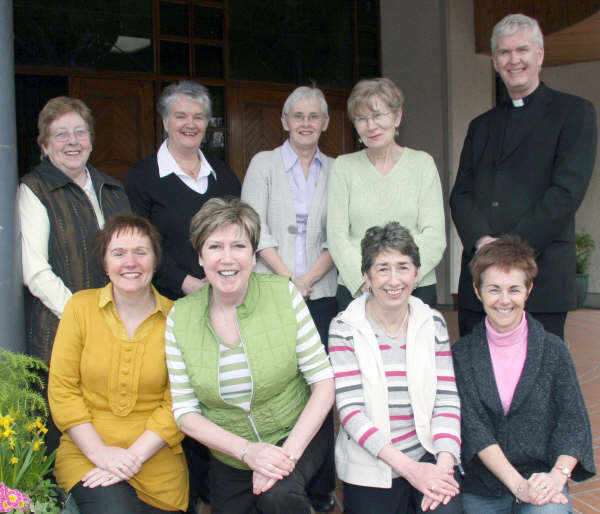Fr McBride pictured with the flower group and some ladies of the parish who clean this beautiful modern church located on the outskirts of Lisburn.