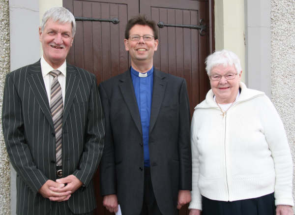 Allister Mallon pictured with churchwardens Wallace McMillan and Annie McDonald. 