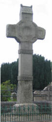 The cross at Dromore Cathedral. The inscription reads: “The ancient historical cross of Dromore. Erected and restored after many years of neglect by public subscription to which the Board of Public Works were contributors, under the auspices of the Town Commissioners of Dromore, County Down, 21.D.1887.” 
