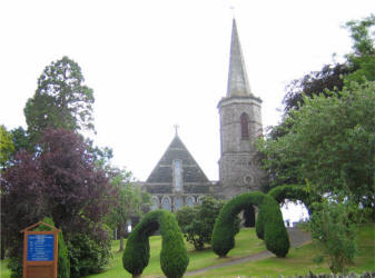 Parish Church of St. Patrick, Drumbeg.  The lower part of the tower is part of the original Church built on the present site in 1798.  The spite was rebuilt in 1833 and incorporated into the design of the present Church, rebuilt in 1870.