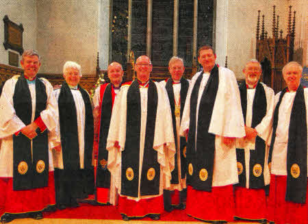 At the installation of Canon James Carson are, from left: the Ven Stephen Forde, Archdeacon of Dalriada, the Rev Helen MacArthur; the Rt. Rev Alan Abernethy, Bishop of Connor; the Ven Dr Stephen McBride, Archdeacon of Connor; the Very Rev John Bond, Dean of Connor; Canon James Carson; Canon John Budd and Canon Stuart Lloyd. Photograph by Norman Briggs.
