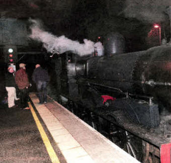 The steam train stopped at Lisburn to take on water.