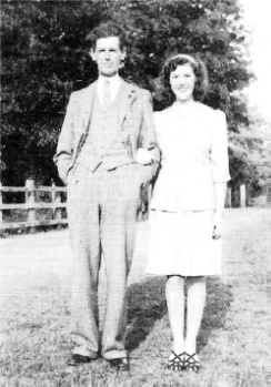 Pat Thompson (nee Armstrong) with her father, Thomas Armstrong at the entrance to Glenavy station.