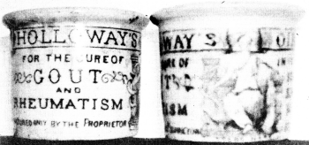 The two Holloway ointment pots showing the firm's address 