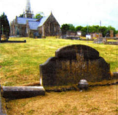 Drummaul Parish Church, Randalstown with the family burying ground of Nelson Bell in the foreground.