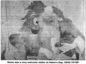 Santa was a very welcome visitor at Helen's Day. US45-767SP