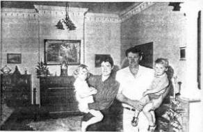 John and Anne Higginson and their children Shivawn (4) and Andrew (2) In the colonial-style lounge room of their 'Woodville' homestead