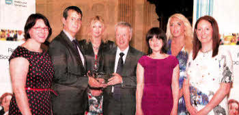Addiction NI team receiving NI Regional Social Work Awards 2012 prize for Overall Winner.
